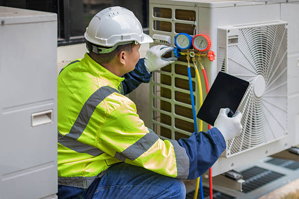 Professional Air Conditioning Repair technician working in Plain City, UT